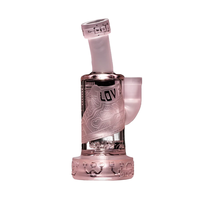 Clear glass water pipe with engraved design on a black background