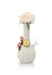 Decorative vase with a white rose and pink flowers on a white background