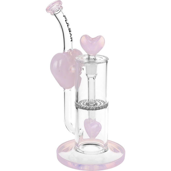 Glass smoking device with heart-shaped components on a white background