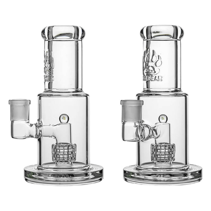 Two clear glass water pipes with intricate designs on a white background