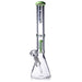 Glass water pipe with green accents on a white background