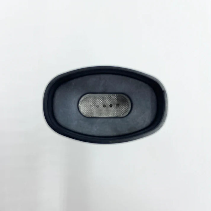 Black oval object with a central metallic component on a white background