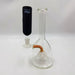 Glass smoking device with a black sleeve on a white background