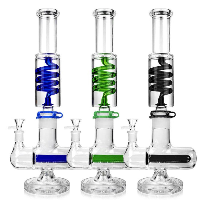Three glass smoking devices with spiral features on a white background