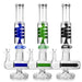 Three glass smoking devices with spiral features on a white background