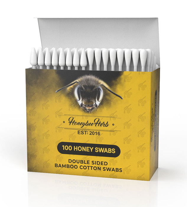 Box of Honeybee Herb cotton swabs with a bee illustration on a white background