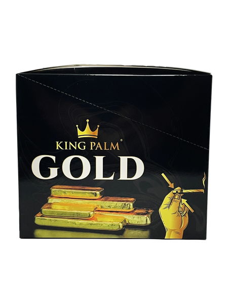 King Palm Gold packaging box, featuring a black background with a gold crown logo, the brand name 'KING PALM', the word 'GOLD' in large white letters, stacked gold bars, and a hand holding a gold lighter.