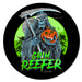 Circular graphic with a grim reaper holding a jack-o'-lantern against a black background