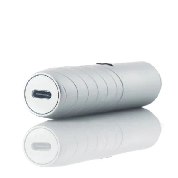 White cylindrical electronic device with USB-C port on a white background