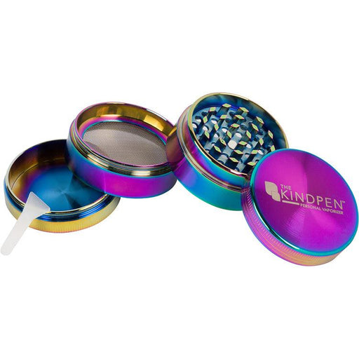 Multicolored metal grinder with 'The Kindpen' branding on a white background
