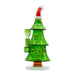 A green Christmas tree-shaped glass bong with multicolored present accents and Christmas light decals, topped with a red Santa hat.