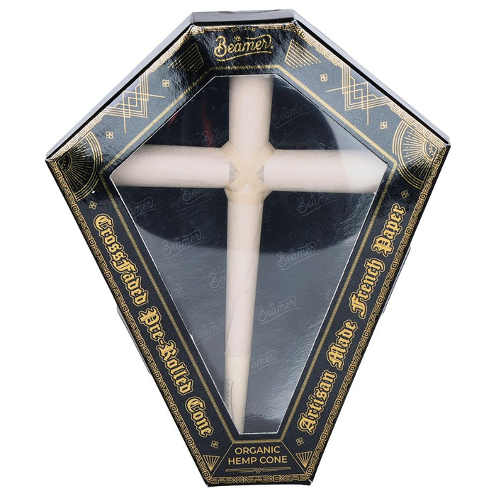 Cross-shaped product in a decorative box with 'Beamer' branding.