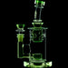 Green glass water pipe on a black background