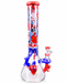 A clear glass water pipe with a red and blue anatomical heart design, featuring a red mouthpiece, blue and red downstem, and a clear glass base on a white background.