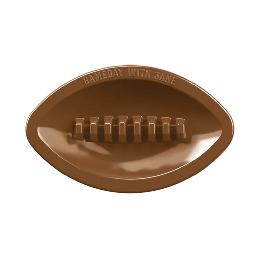 Gameday With Jane Football Ashtray resting on a flat surface showing the football shape