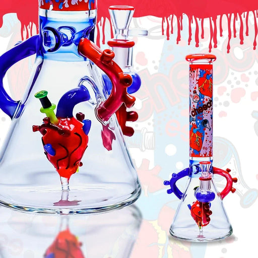 A clear glass water pipe with anatomical heart decorations in red, blue, and green, shown in two views against a stylized white background with red paint drips.