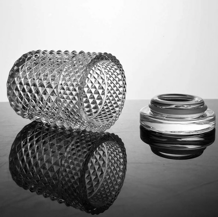 Jane West Twenties Collection Glass Jar – Clear – Clear glass jar and lid on reflective surface