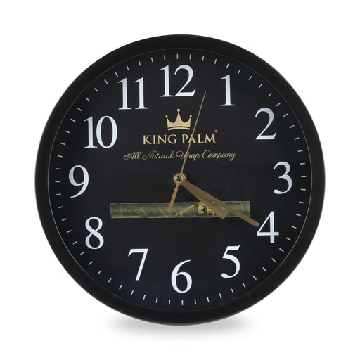 Black wall clock with gold accents and 'King Palm' branding on a white background