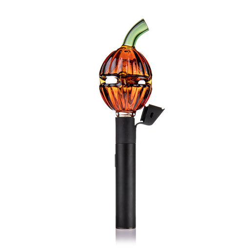 Pumpkin-shaped glass smoking device on a white background