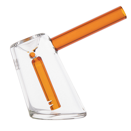 Clear glass cup with an orange handle on a white background