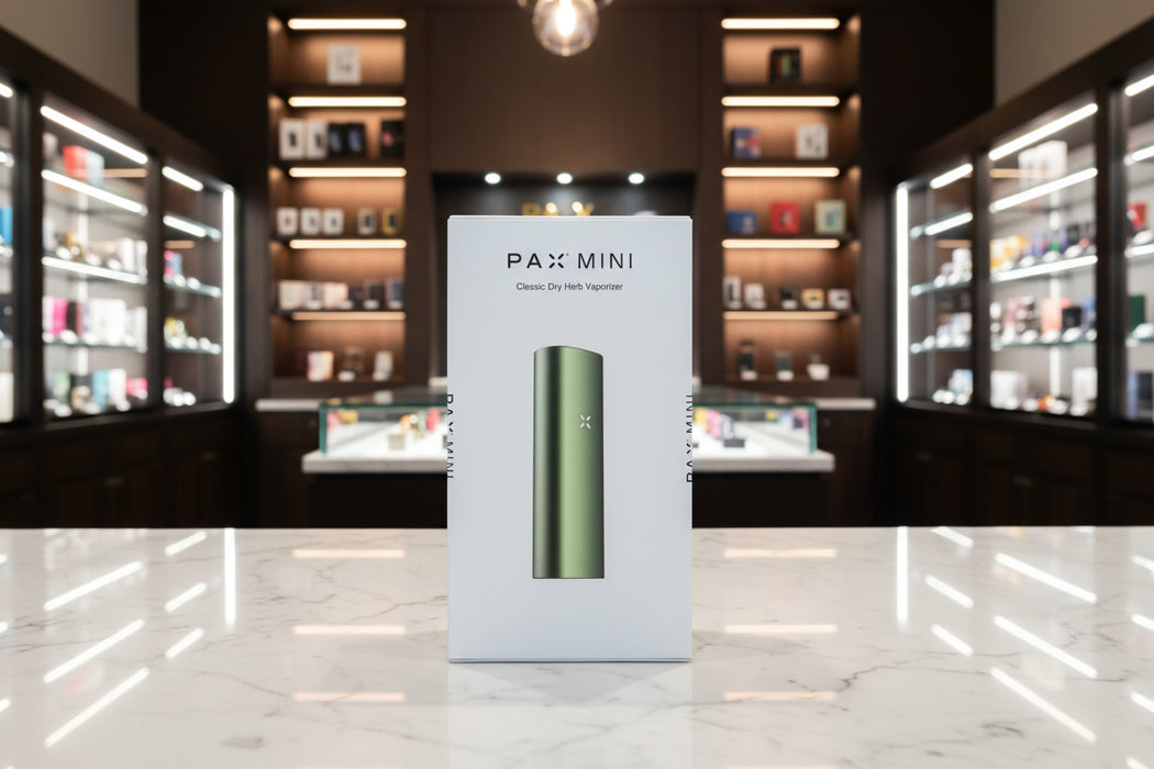 Pax Mini classic dry herb vaporizer packaging on a white background