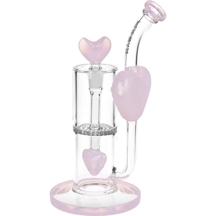 Glass smoking device with pink heart shapes on a white background