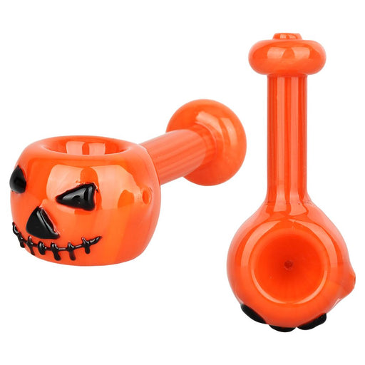 Front view of the Pumpkin Halloween Glass Hand Pipe with jack-o-lantern design.