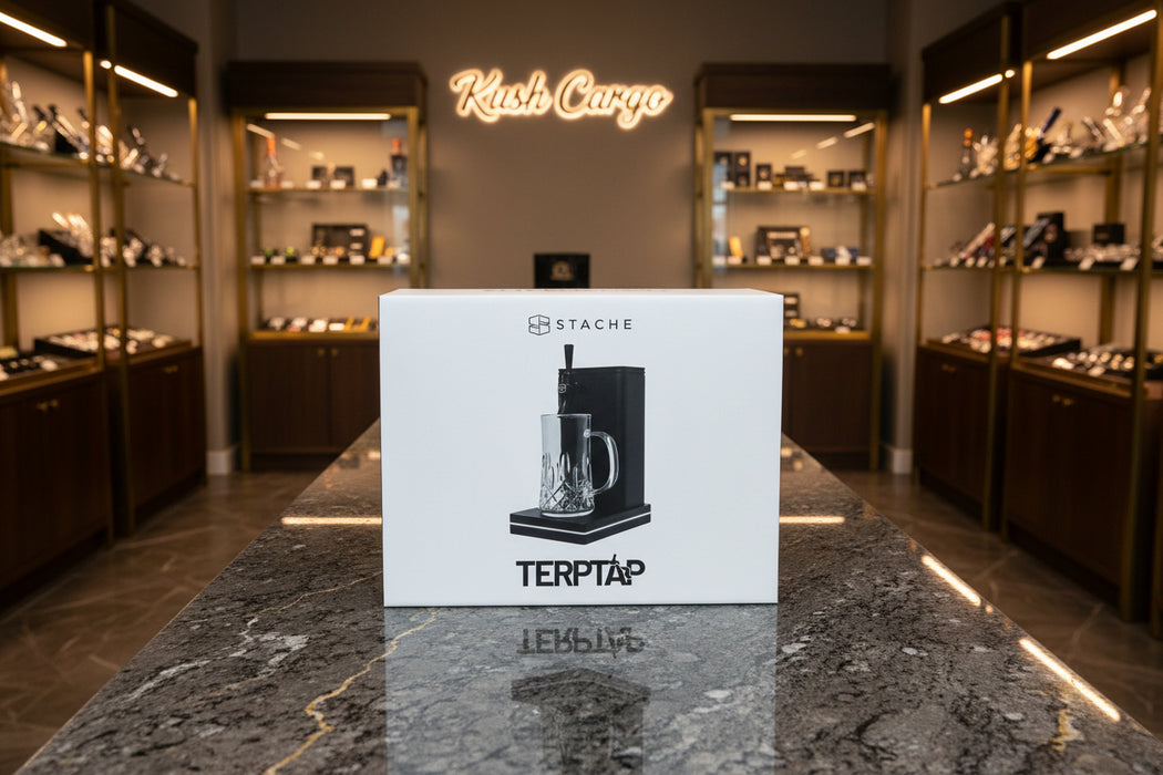 Stache TERPTAP product packaging with a clear glass and black dispenser.