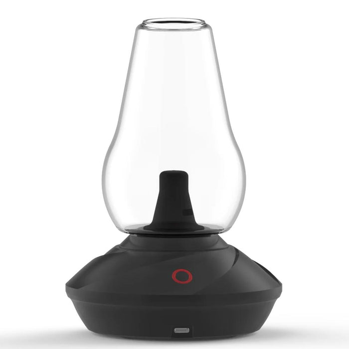 The image shows the Zenco Uno Vaporizer with a wood finish base and a clear glass tank sitting on top. There is a red power indicator on the base.